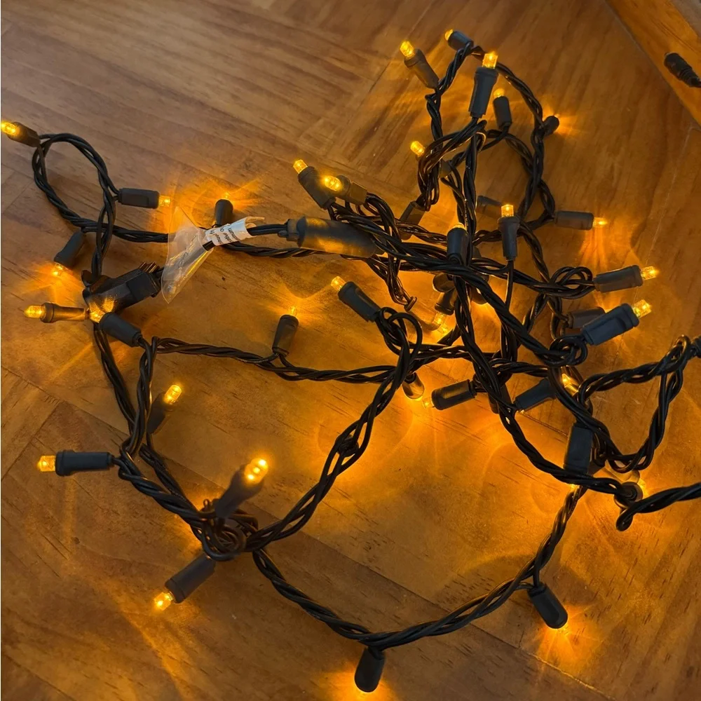 Festive Black String Lights with Yellow Tips